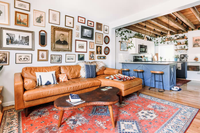  Stylish Ways To Decorate The Space Above Your Couch